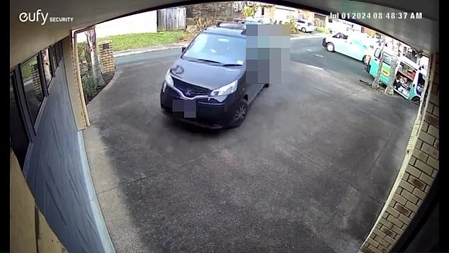 CCTV captured the moment a van suddenly made a 180-degree turn and veered off the road, ploughing into a Tesla owner's garage in Auckland at 8:48am on Monday