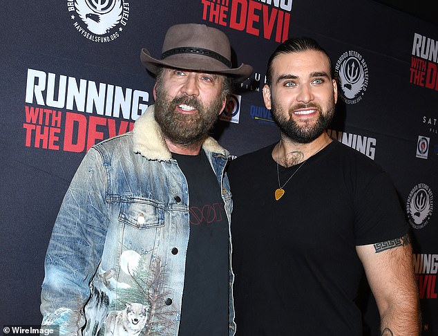 Weston, 33, the son of Fulton and actor Nicolas Cage, was arrested Wednesday for assault with a deadly weapon, the LAPD confirmed. He was subsequently released the same day. (Pictured: Nicolas and Weston in 2019)