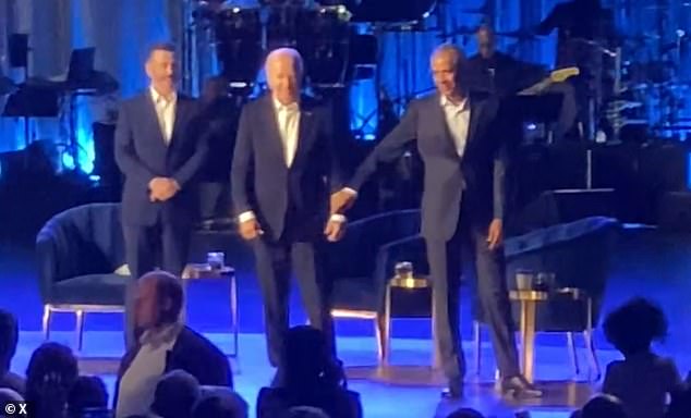 Obama gave Biden a gentle tug on the arm and led him off the stage after the president froze during applause at a Los Angeles fundraiser in June.