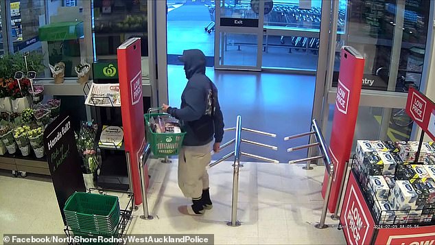 The police officer saw the man, who was wearing a hoodie and shorts, when he walked out of the wrong exit of the store (photo)