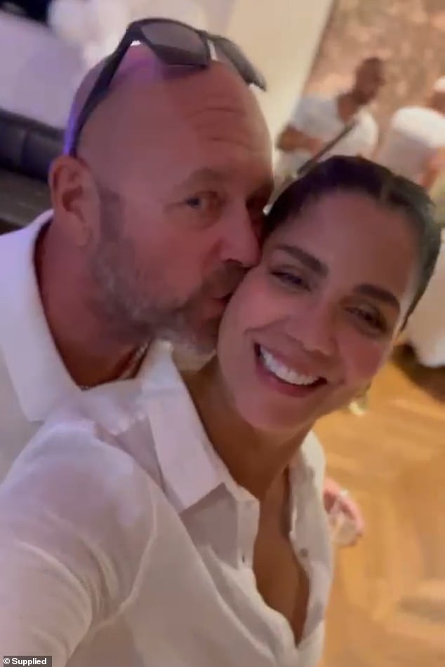 Nick Noble, 54, suffered an aneurysm while on a scooter on a surfing holiday in Bali with his Brazilian-born wife Simone Chedid, 52, on June 24. The couple are pictured