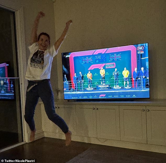 Nicole Piastri jumps for joy after her son Oscar Piastri takes his first F1 victory