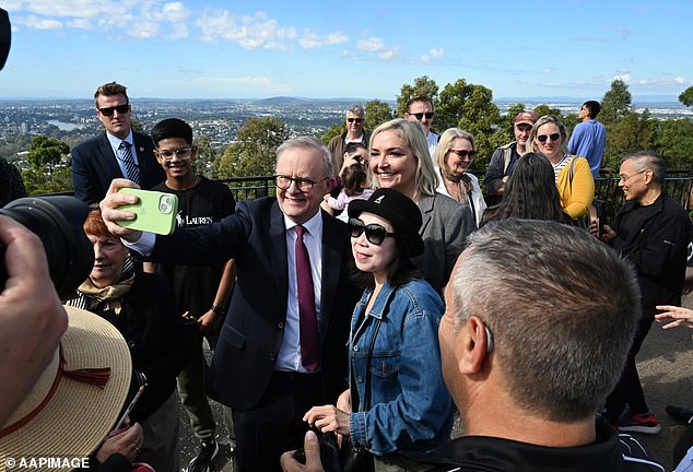 Prime Minister Anthony Albanese is seen with supporters this week. This prime minister is developing an unhealthy tendency to speak out of two mouths at the same time, writes PETER VAN ONSELEN