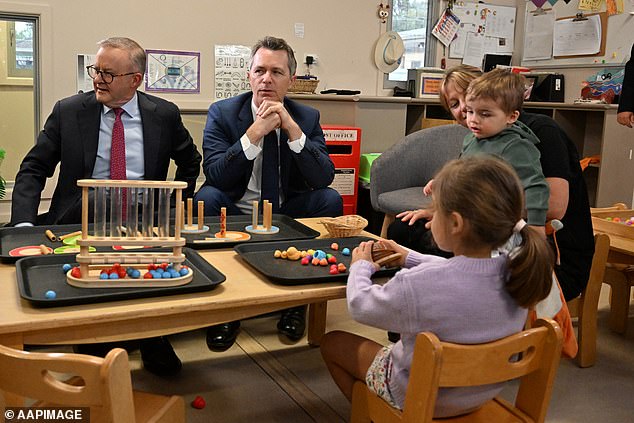 Jason Clare's presence in the community is noticeably absent, adding to speculation that he could be a surprise departure at the age of 52 (pictured with Anthony Albanese in 2023 at an early childhood education centre in Queanbeyan)