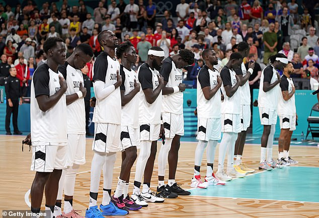 South Sudan's Olympic basketball debut began Sunday with an awkward national anthem disruption