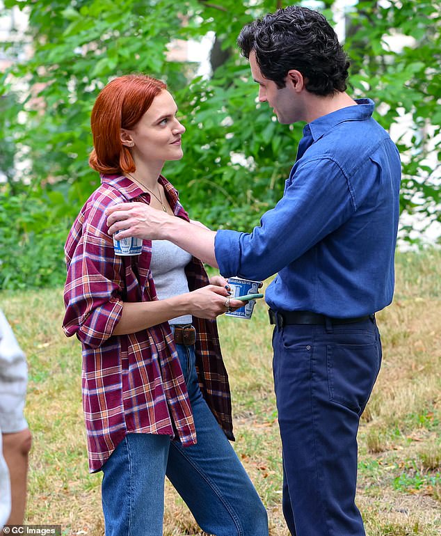 Penn Badgley, 37, and The Handmaid's Tale star Madeline Brewer, 32, cozied up to each other while filming the fifth and final season of the Netflix thriller You in New York City's Central Park on Monday.