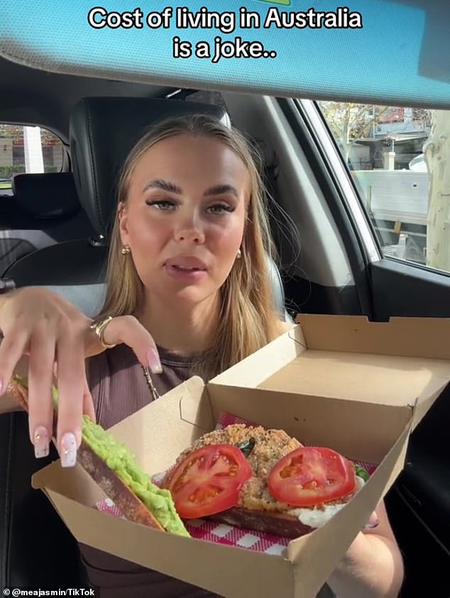 Influencer Mea Jasmin (pictured) was shocked when she paid $40 for her two takeout meals - a vegan sandwich (pictured) and a mashed avocado