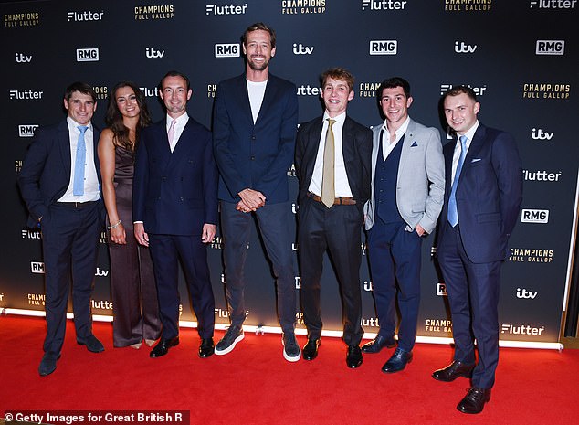 Peter Crouch (centre, with L-R Harry Skelton, Bryony Frost, Nico de Boinville, Harry Cobden, Gavin Sheehan and Sean Bowen) praised Champions: Full Gallop for giving racing fans 'a glimpse behind the scenes'