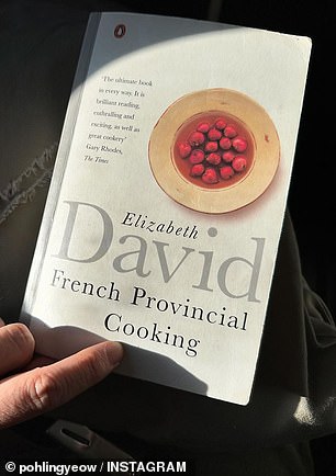 Poh shared two photos on Instagram on Tuesday in which she holds the classic cookbook French Provincial Cooking.