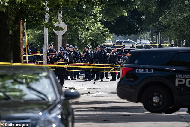 More than 100 officers swarmed to the scene near North 14th and West Vliet Streets outside the security perimeter after shots rang out