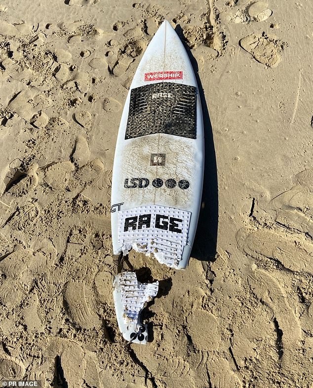 The shocking, chewed-up remains of Kai McKenzie's surfboard after last week's shark attack