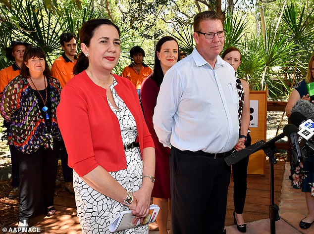 Labor MP Barry O'Rourke (pictured with then Queensland Premier Annastacia Palaszczuk) has been charged with 