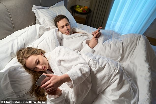 Is your partner or spouse always glued to their phone or computer? Maybe work is crazy right now, or they're busy chatting with someone (stock image)