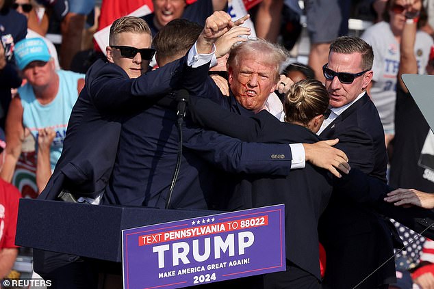 President Donald Trump raised his fist in protest Saturday night after a bullet hit his ear, leading some Republicans to believe he will be re-elected in November