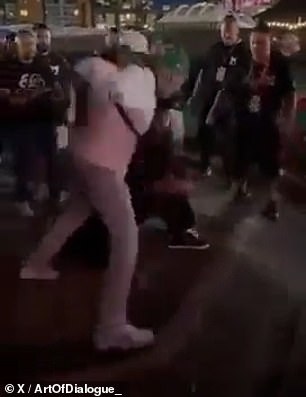 Footage of the incident shows one of the men punching Ross in the face after a brief exchange of words