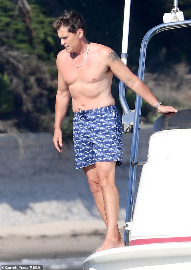 Rob Lowe, 60, showed off his incredible body as he went topless for the 4th of July celebration with his sons in Santa Barbara, California on Thursday