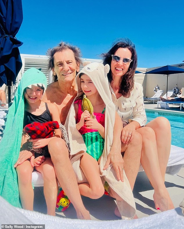 Ronnie Wood, 76, and his wife Sally, 45, shared a cute poolside snap on Instagram on Friday as the rocker enjoyed a break from The Rolling Stones' Hackney Diamonds Tour