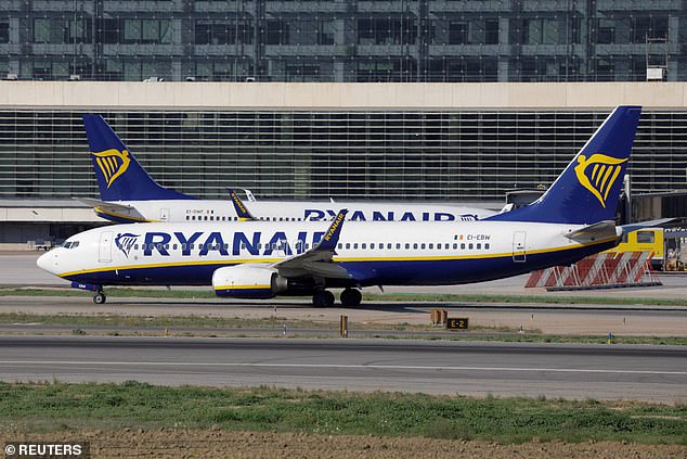 Stuart Wilson, 52, said he rushed to help after a 6ft 3in drunk man woke up and 'went bananas' on the Ryanair flight from Manchester Airport to the Spanish island on July 1 (file photo of Ryanair plane)