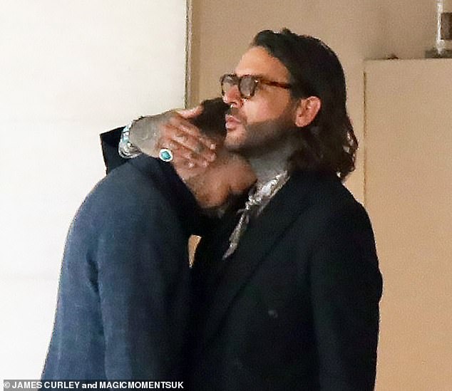 In photos obtained exclusively by MailOnline, the 31-year-old I'm A Celebrity winner was spotted having an emotional chat with his close friend in the smoking room of London's Grosvenor House Hotel.