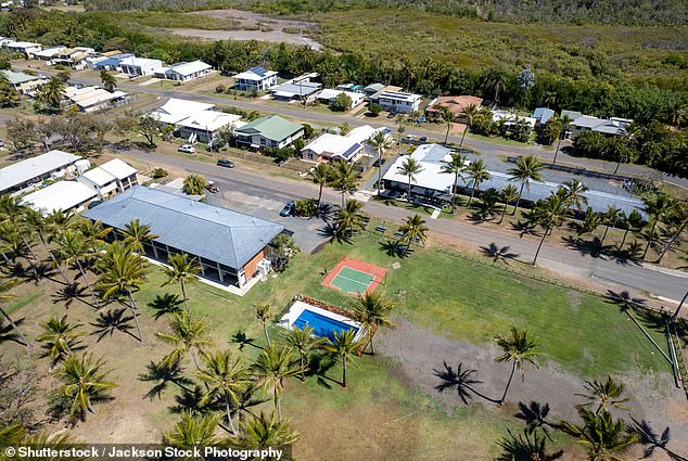 A man has died after being crushed under a train carrying walking sticks in Sarina (pictured) in north Queensland