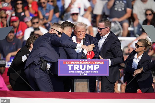 Secret service rush bloodied Trump off stage as ex president fist