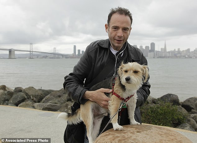 Timothy Ray Brown with his dog Jack on Treasure Island in San Francisco in 2011. Brown, known for years as the Berlin Patient, received a transplant in Germany from a donor with natural resistance to the AIDS virus. It was thought to have cured Brown's leukemia and HIV