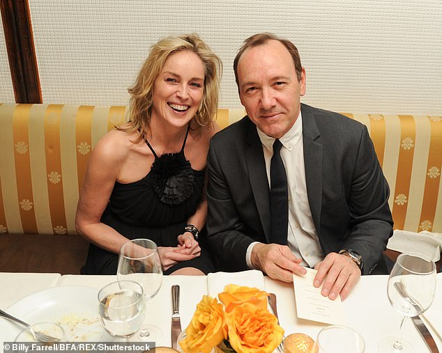 Stone and Spacey are pictured looking cozy at a pre-Oscars dinner in Los Angeles in 2011