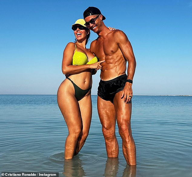 Cristiano Ronaldo and his partner Georgina Rodriguez looked more in love than ever as they soaked up the sun during a lavish family getaway to Saudi Arabia on Sunday