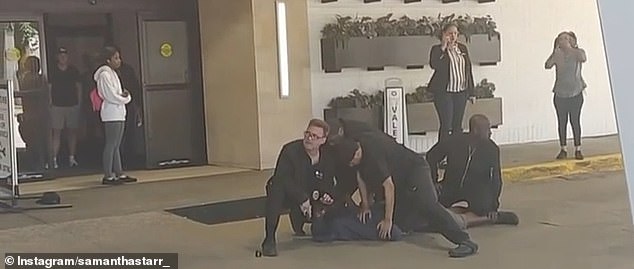 Shocking video shows four Hyatt security guards pinning down man