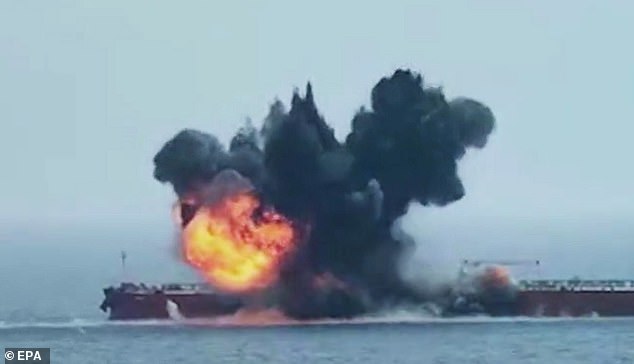 Dramatic footage shows the moment Houthi rebels target a crude oil tanker in the Red Sea, before setting the unfortunate vessel up in flames.