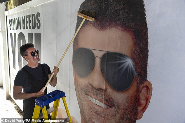 In his search for his newest stars, Simon has been spotted on the streets of London with a sign that reads: 'Simon needs you. Future megastars wanted for new boy band'