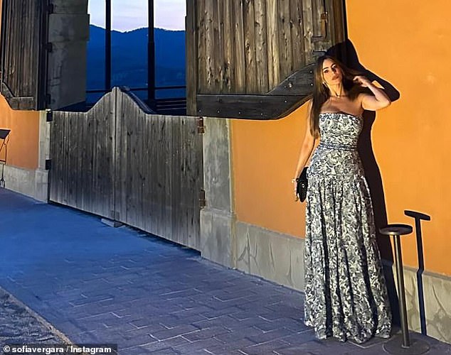 Sofia Vergara stunned in a blue floral dress as she shared photos from her Italian getaway with boyfriend Justin Saliman and son Manolo