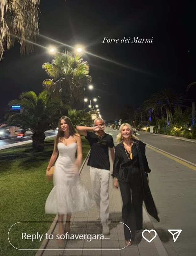 The trio of Vergara, Tavallini and Soare were captured again as they walked through a less busy street during a visit to Forte dei Marmi