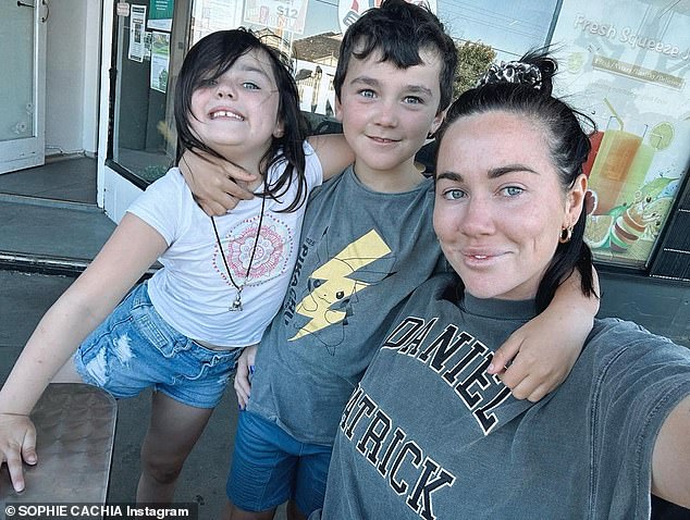 Sophie shared a photo of herself posing in front of a mirror in a blue tracksuit and matching blue and white trainers. She captioned the photo with a rundown of her entire week with children Bobby, nine, and Florence, seven (all pictured)