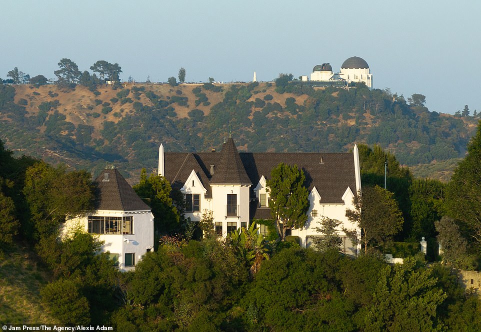 A sprawling fairytale-style castle has been put up for sale for $15 million - and it's had some very impressive owners in its time, including The Beatles, Marlon Brando and Debbie Reynolds