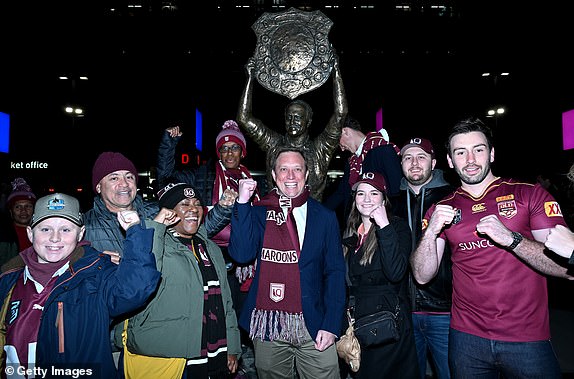 BRISBANE, AUSTRALIA - JULY 17: Queensland Premier Steven Miles poses for a photo with football fans before match three of the 2024 men's State of Origin series between Queensland Maroons and New South Wales Blues at Suncorp Stadium on July 17, 2024 in Brisbane, Australia. (Photo by Bradley Kanaris/Getty Images)