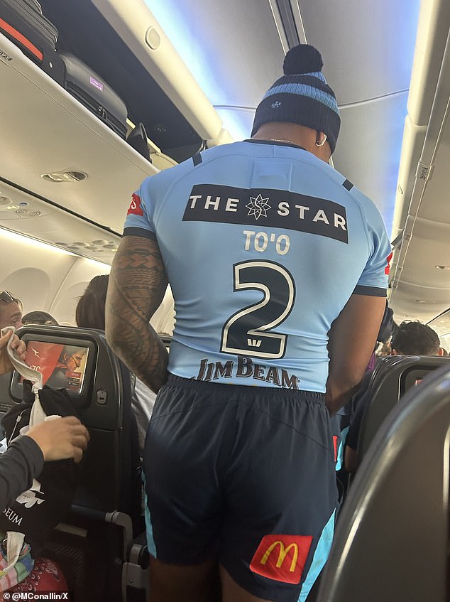 Blues hero Brian To'o (pictured) boarded a plane to Sydney on Thursday still dressed in his playing kit, plus a NSW hat - and fans were thrilled