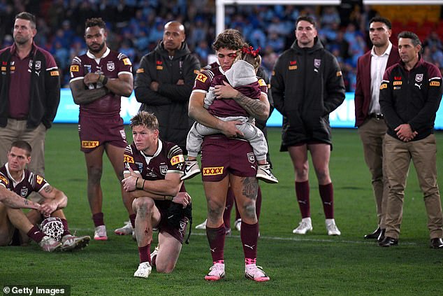 Maroons' Reece Walsh looks disheartened by his teammates after NSW won the Origin deciding match 14-4 in Brisbane