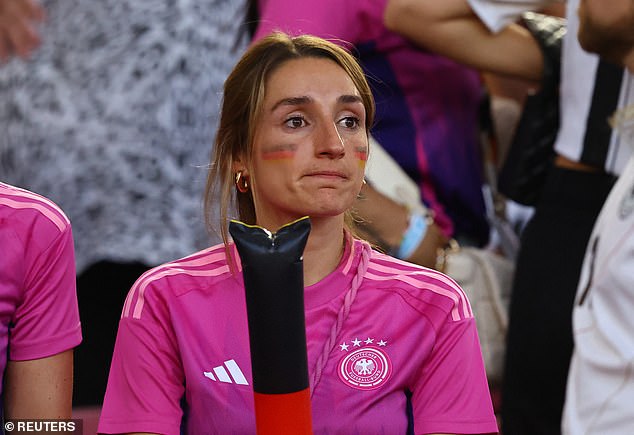 The German WAGs looked dejected after losing to Spain in the quarter-finals of Euro 2024 (pictured: Julian Nagelsmann's girlfriend Lena Wurzenberger)