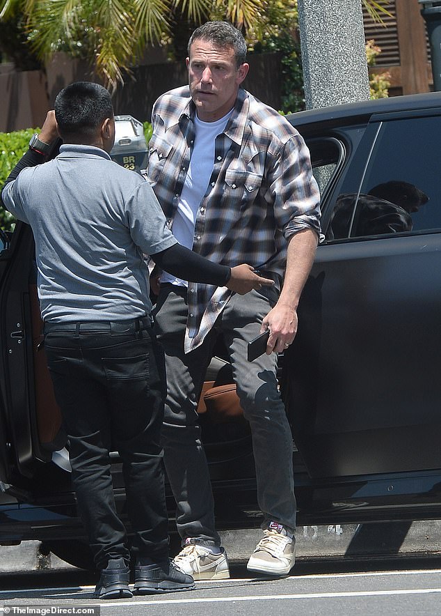 Ben Affleck still wore his wedding ring as he stepped out for lunch in LA on Friday — after spending the Fourth of July away from rumors about his estranged wife Jennifer Lopez