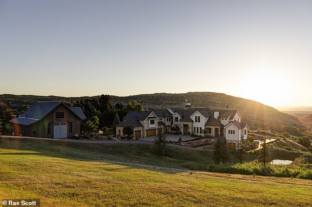 A stunning Colorado mansion with breathtaking mountain views and a lavish barn has just hit the market for a whopping $12 million