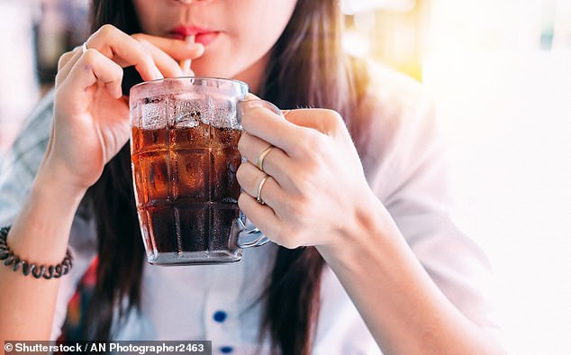 Experts estimate that the sugar tax on soft drinks, introduced in 2018, has reduced the number of people under 18 who need to have a tooth pulled due to decay by 12 percent (Stock Image)