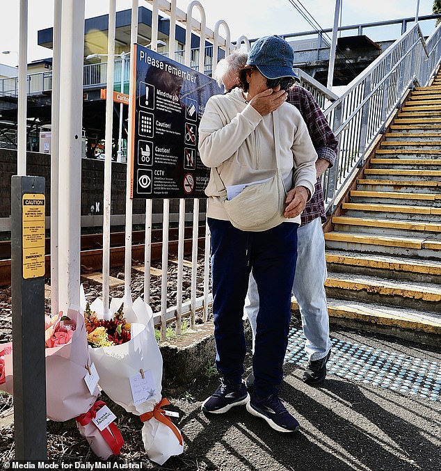 According to Paul Dunstan, Chief of the New South Wales Police, an investigation is underway to determine what caused the pram to roll. He said it could have been something as simple as a 'gust of wind' (pictured are relatives at the scene of the accident).