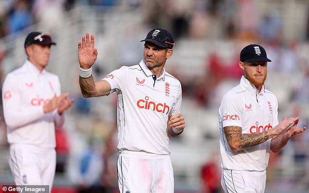 Jimmy Anderson (centre) took two wickets to leave England on the brink of victory