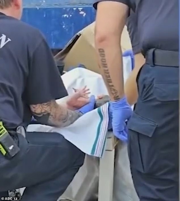 Heartbreaking footage shows officers arriving at a Houston apartment building and finding the baby boy in a bag