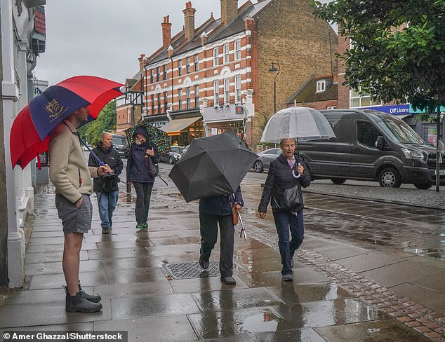 According to the Met Office, the UK had a dry, cool and sunny June. Wales and southern England received much lower than average rainfall. Pictured, wet weather in Wimbledon, London, 15 June 2024