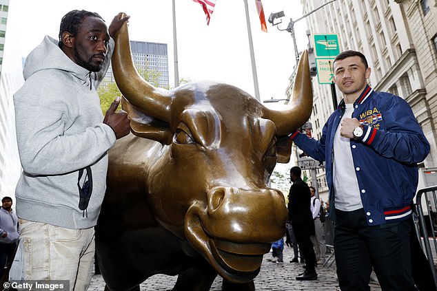 Terence Crawford (L) and Israil Madrimov of Uzbekistan (R) pose for a photo on Wall Street