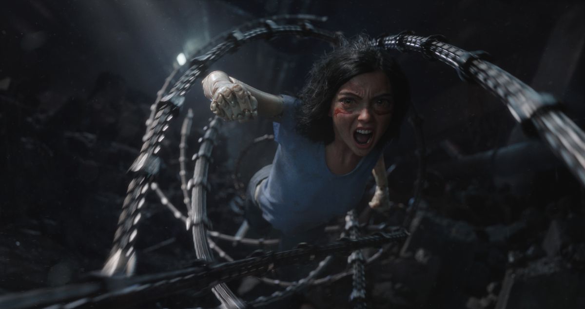 Rosa Salazar as Alita in Alita: Battle Angel, preparing to angrily punch her.