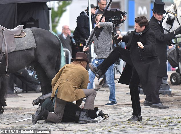 James Norton really got into character as he brutally kicked a fellow actor when he made his first appearance filming The House Of Guinness in Liverpool on Monday