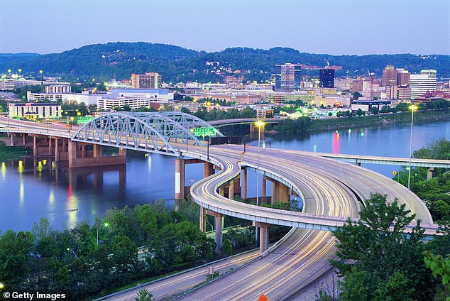 Cities across the US – including several in West Virginia (pictured) – offer financial incentives to move